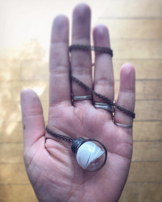 Glass Globe Necklace with White Feather